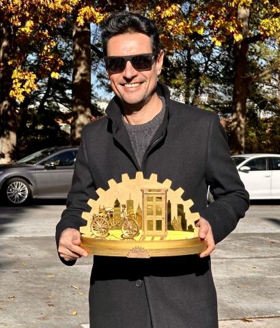 Francisco Valdes with a 2023 Bikeober trophy