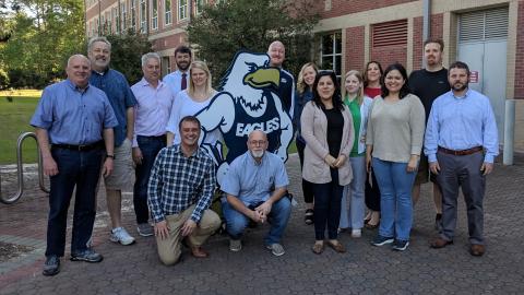 Caitlyn Wine with her program cohort in 2019 Caitlyn Wine with her program cohort in 2019